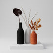 Serrana Glass Minimalist Textured Pottery Bottle Vases — unglazed matte pottery for dried botanicals and shelf decor