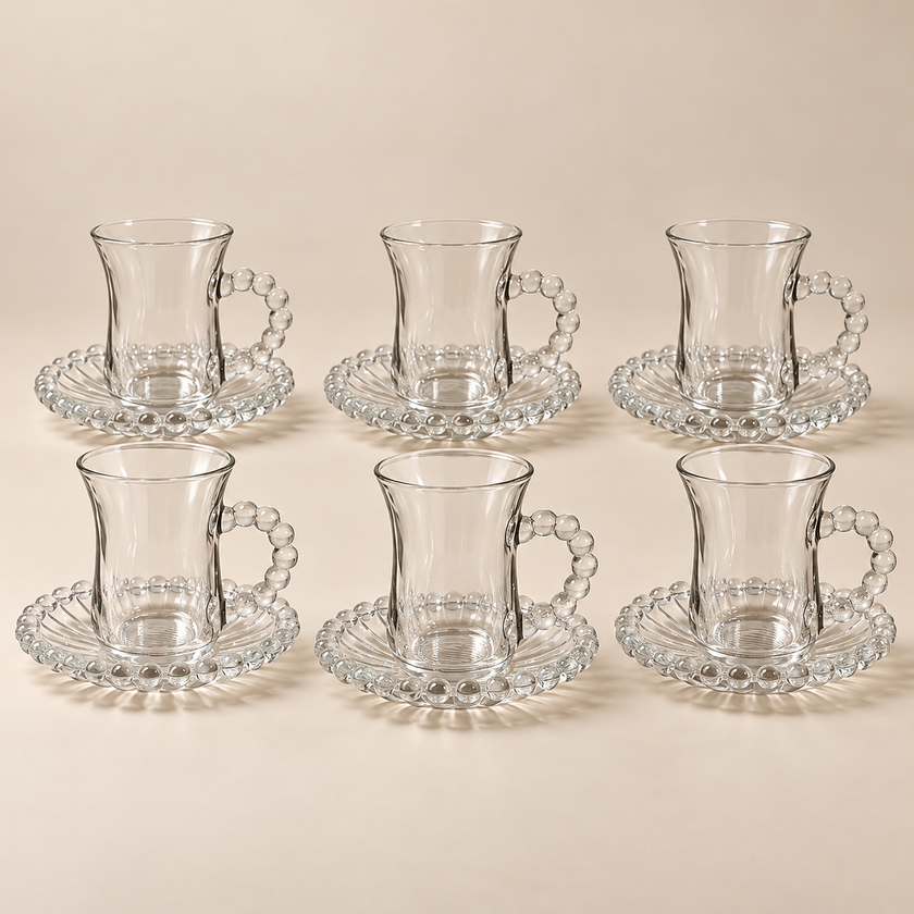 Complete Perla set of six 100 ml glass cups and six beaded saucers on light beige