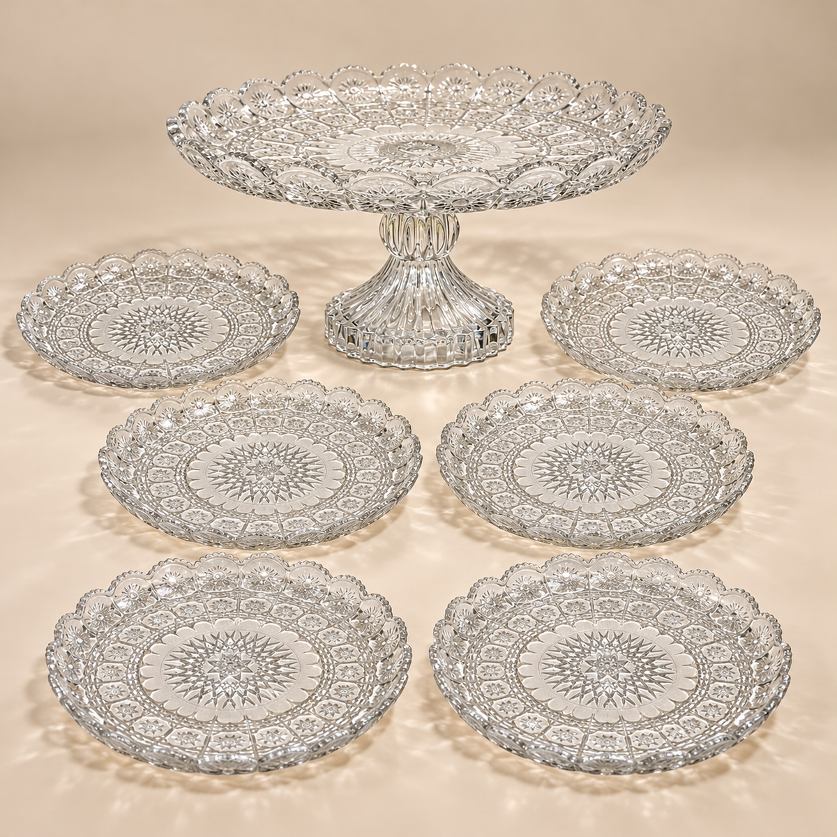 Rosette seven-piece glass set with one footed serving plate and six dessert plates on beige