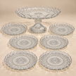 Rosette seven-piece glass set with one footed serving plate and six dessert plates on beige
