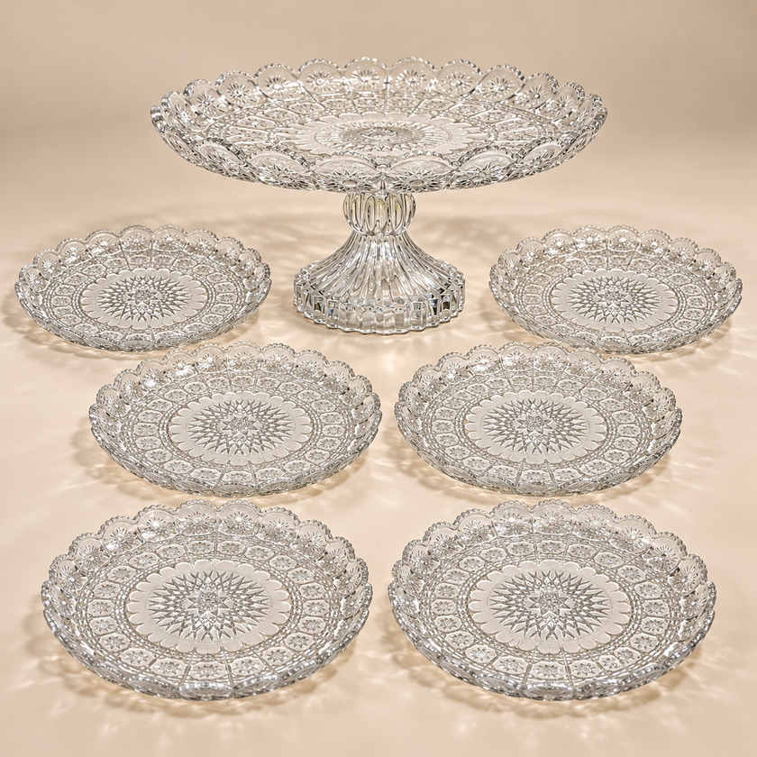 Rosette seven-piece glass set with one footed serving plate and six dessert plates on beige