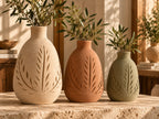 Botanical carved pottery vase set in cream, terracotta and olive