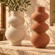 Sculptural pottery vase set in cream and terracotta